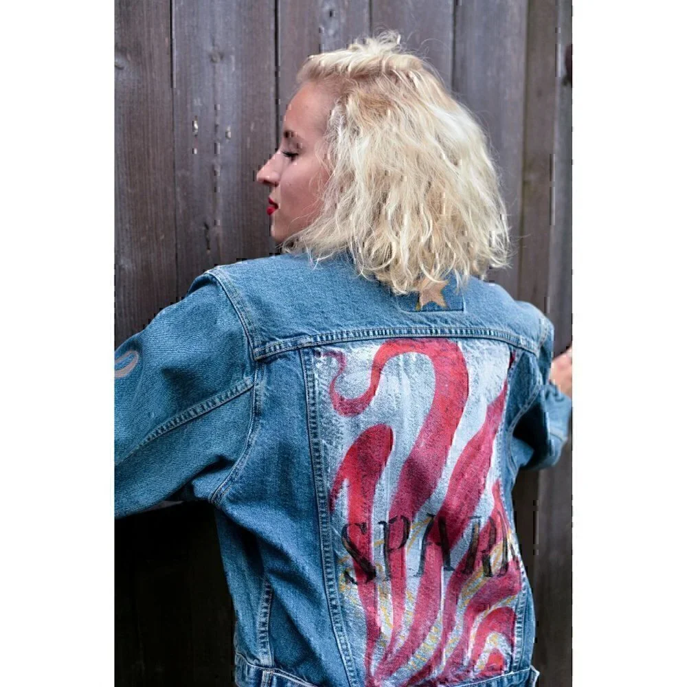 Vintage faded denim classic jean jacket. Retro cut with hand painted images